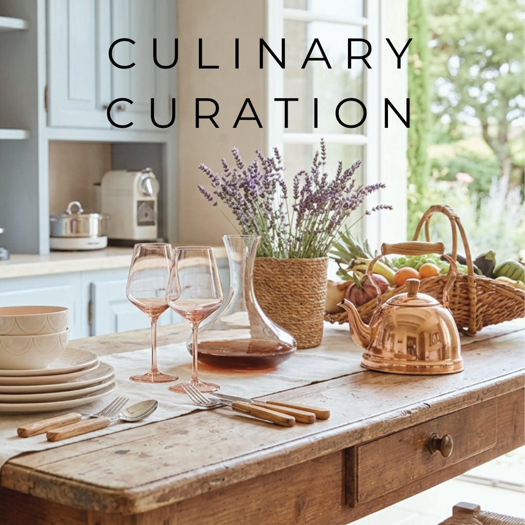 Culinary Curation category image - aesthetic organization tools, and modern dining accessories on a kitchen table with lavenders in a vase, in a light kitchen.