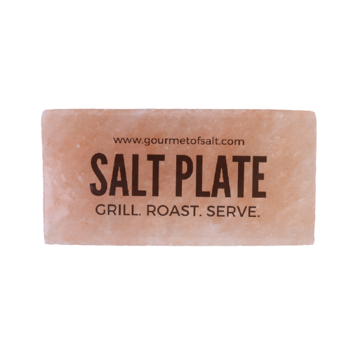 Salt plate with text 'SALT PLATE GRILL. ROAST. SERVE.' on a white background
