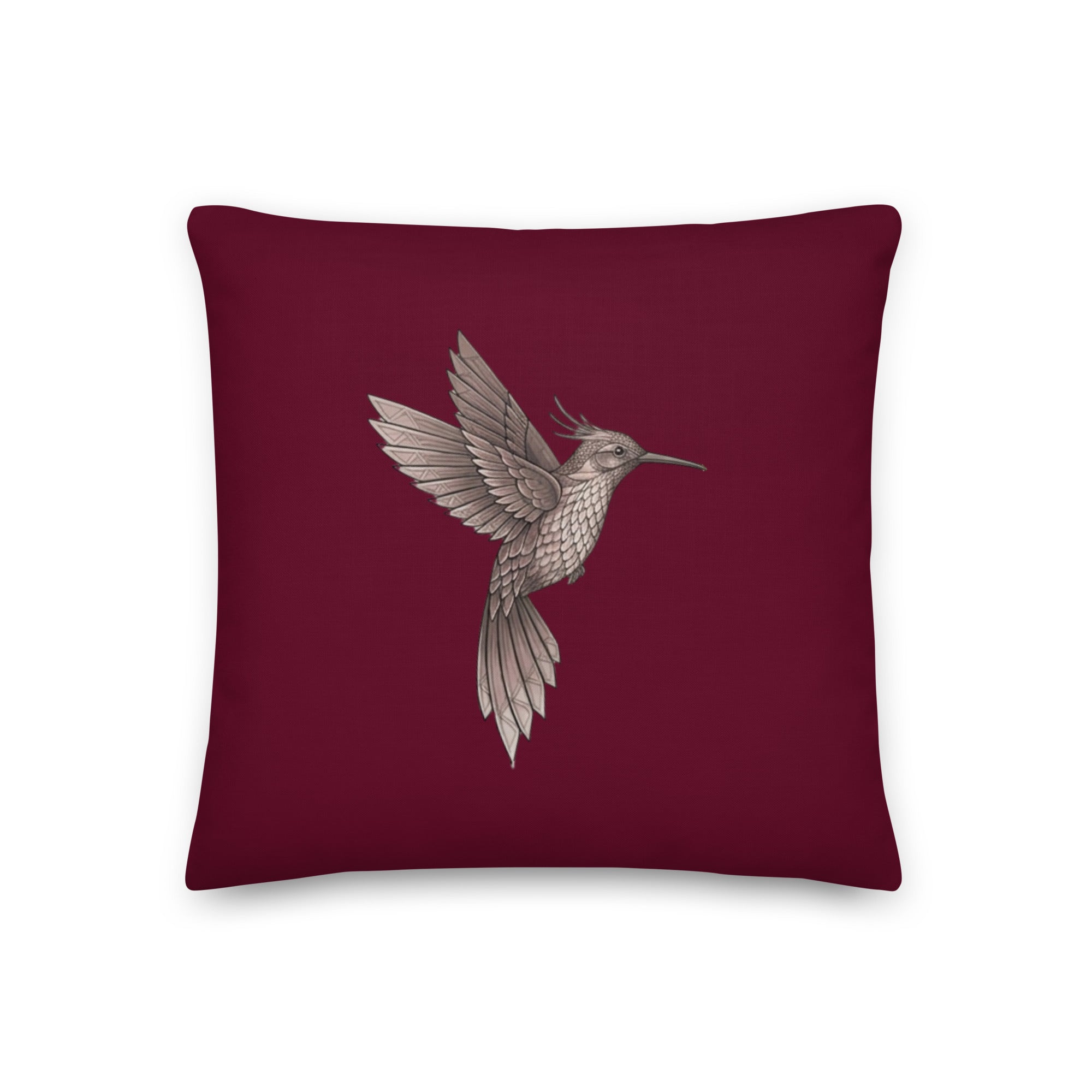 Product mockup - Hummingbird on a berry background pillow.