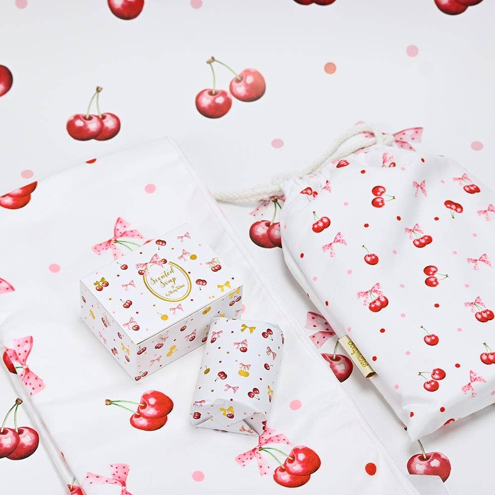 Cherry Bloom soap packaging with cherry and bow design and a gift bag