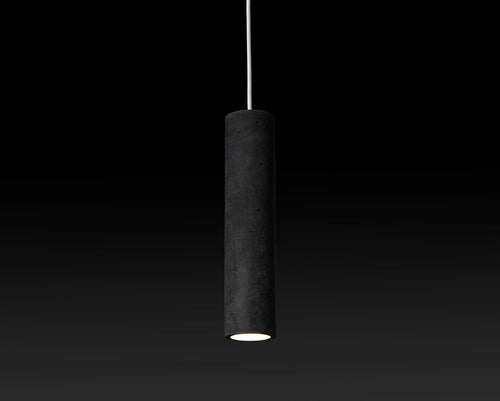 Cylindrical pendant light fixture on a black background