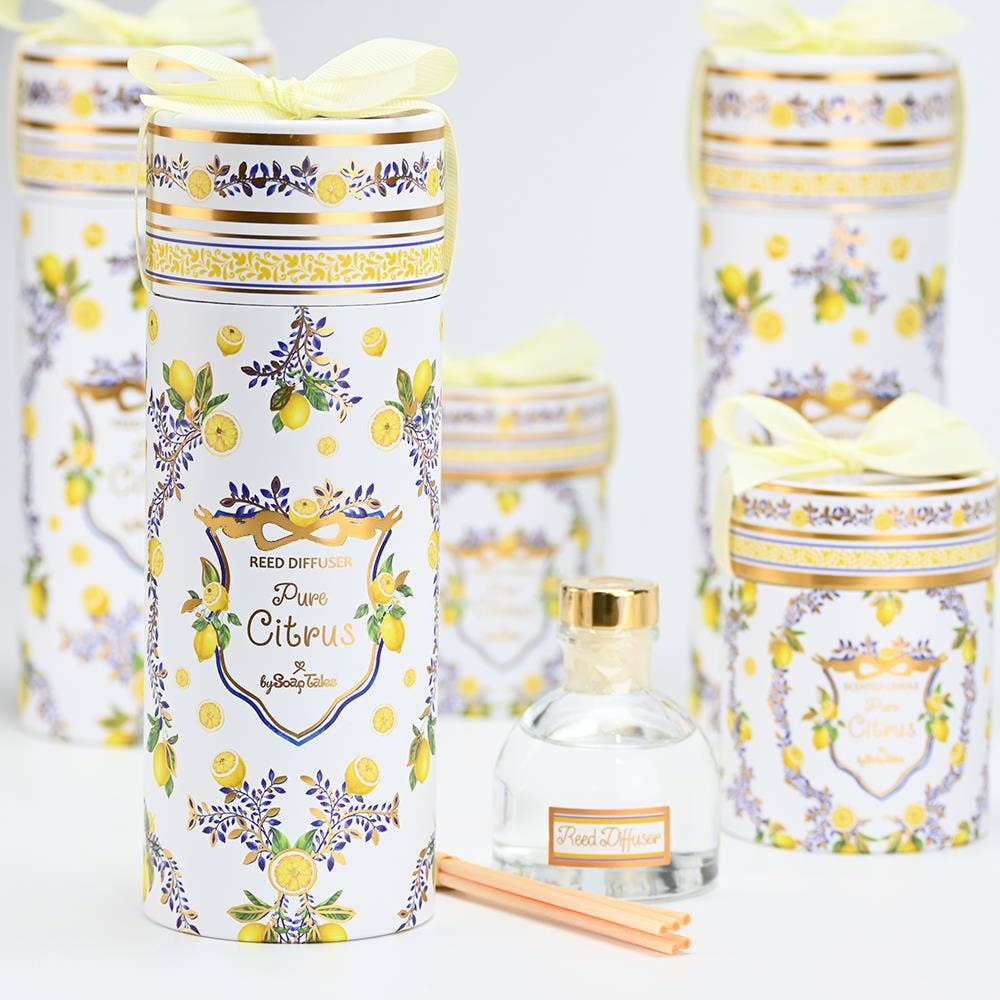 Decorative diffuser bottles with lemon and lavender design on a light background