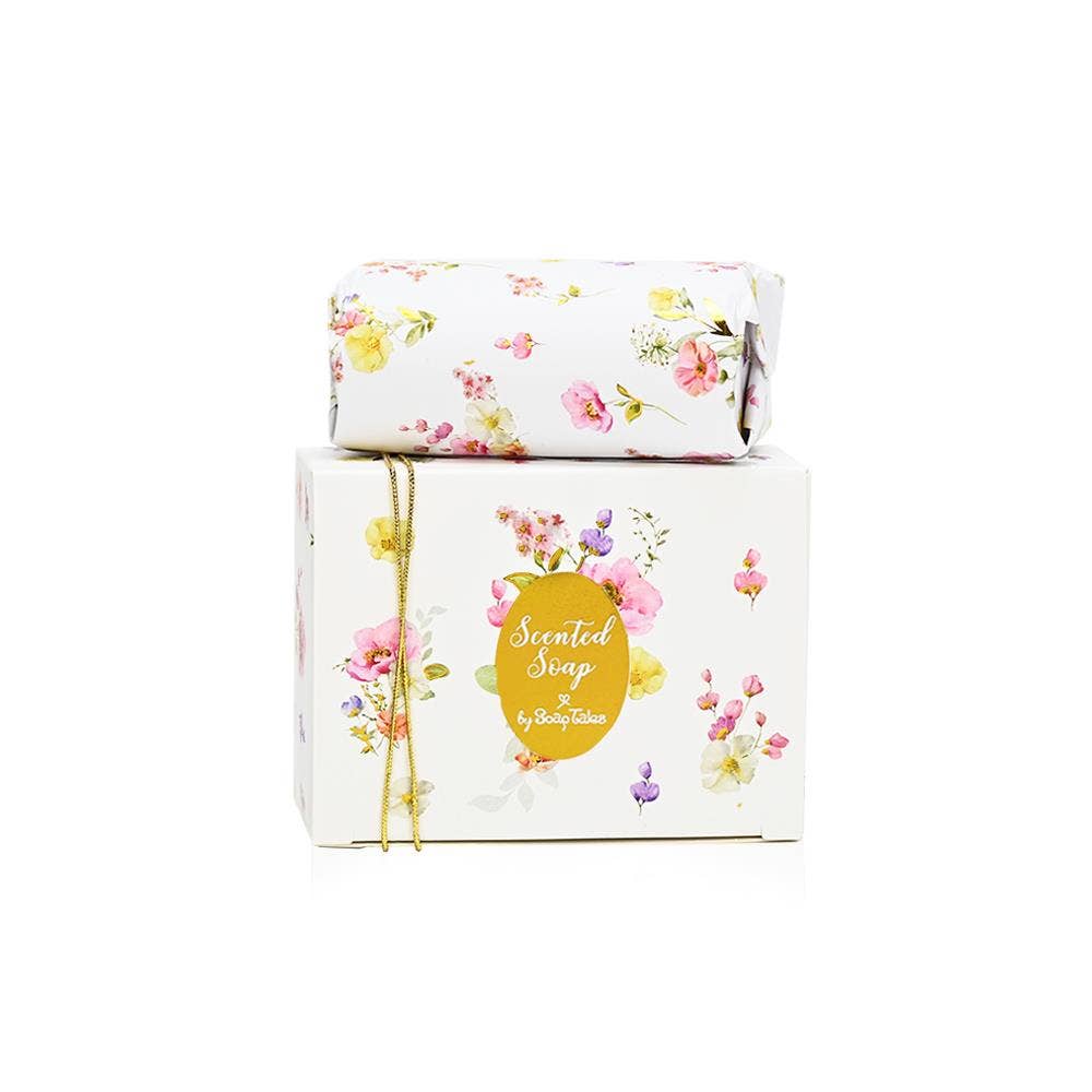 A 100g bar of White Jasmine scented soap in a luxury white box decorated with delicate floral patterns and gold accents.