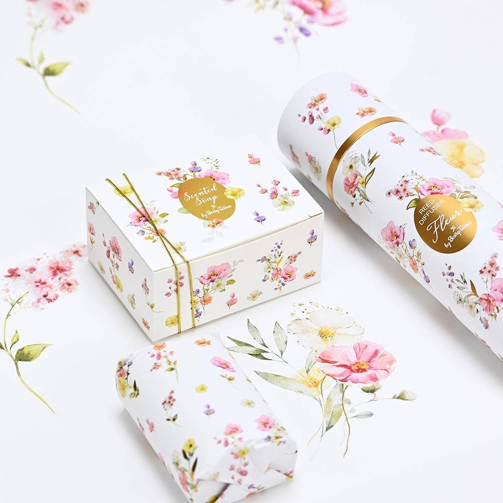Floral-themed soap packaging on a white background