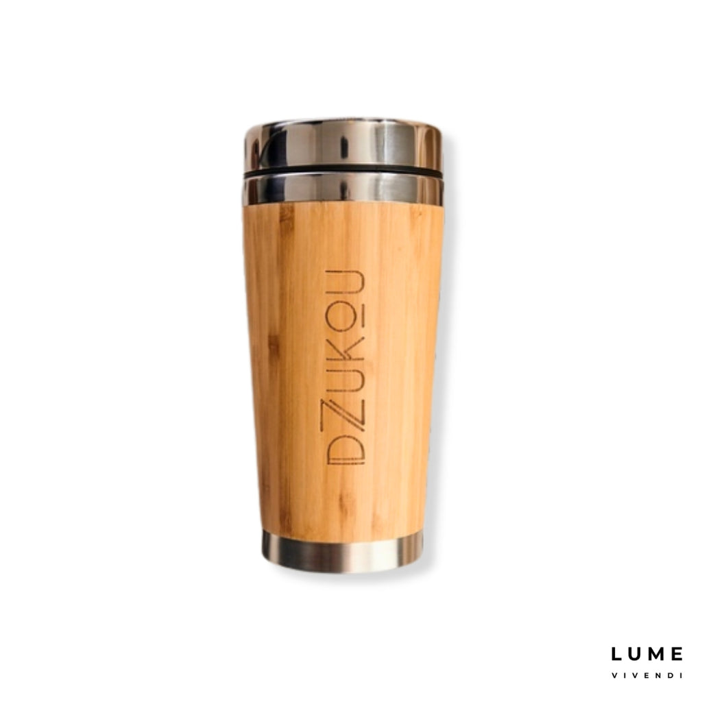 Wooden tumbler with silver lid on a white background, featuring the brand 'DZUKOU'.